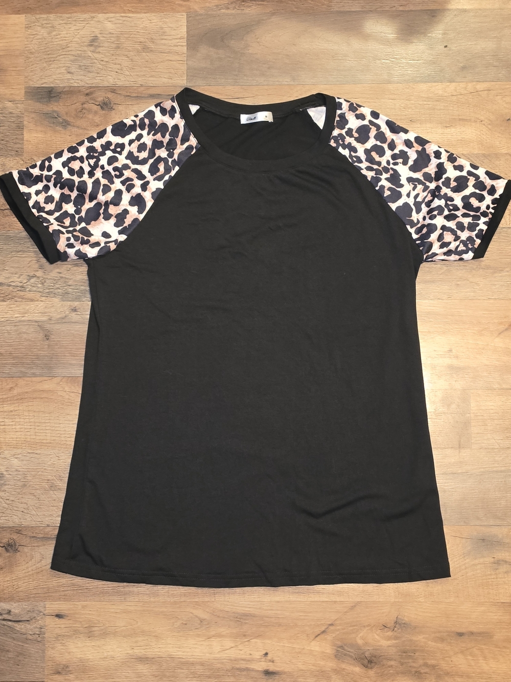 Black Raglan Top with Pink Leopard Sleeve Accents